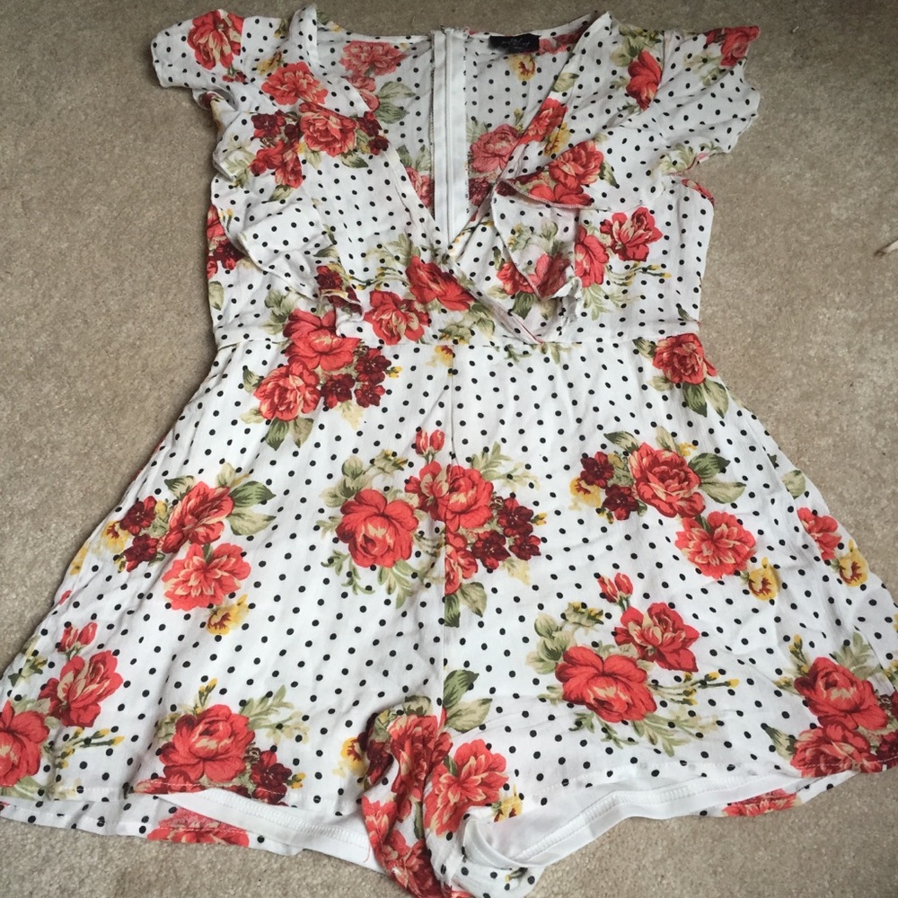Adorable romper worn one time!